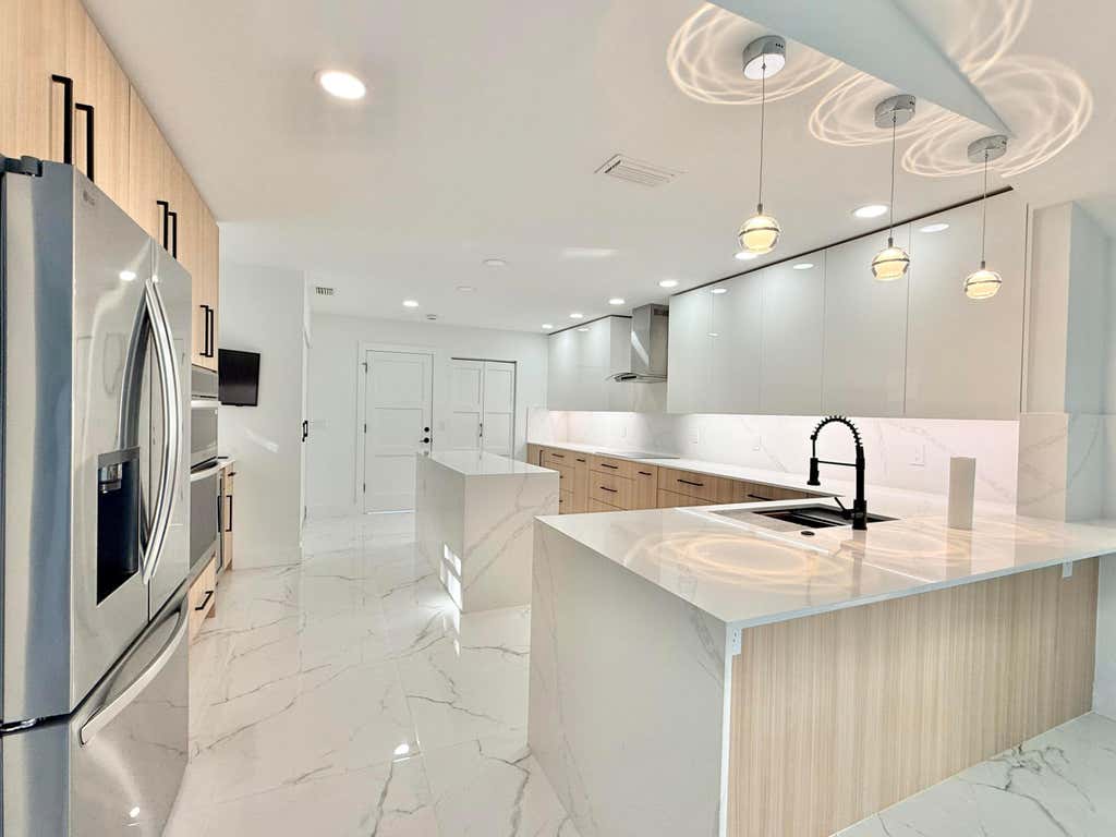 Photo of 53 Northwoods Lane, Boynton Beach, FL 33436 (MLS # B26025283)