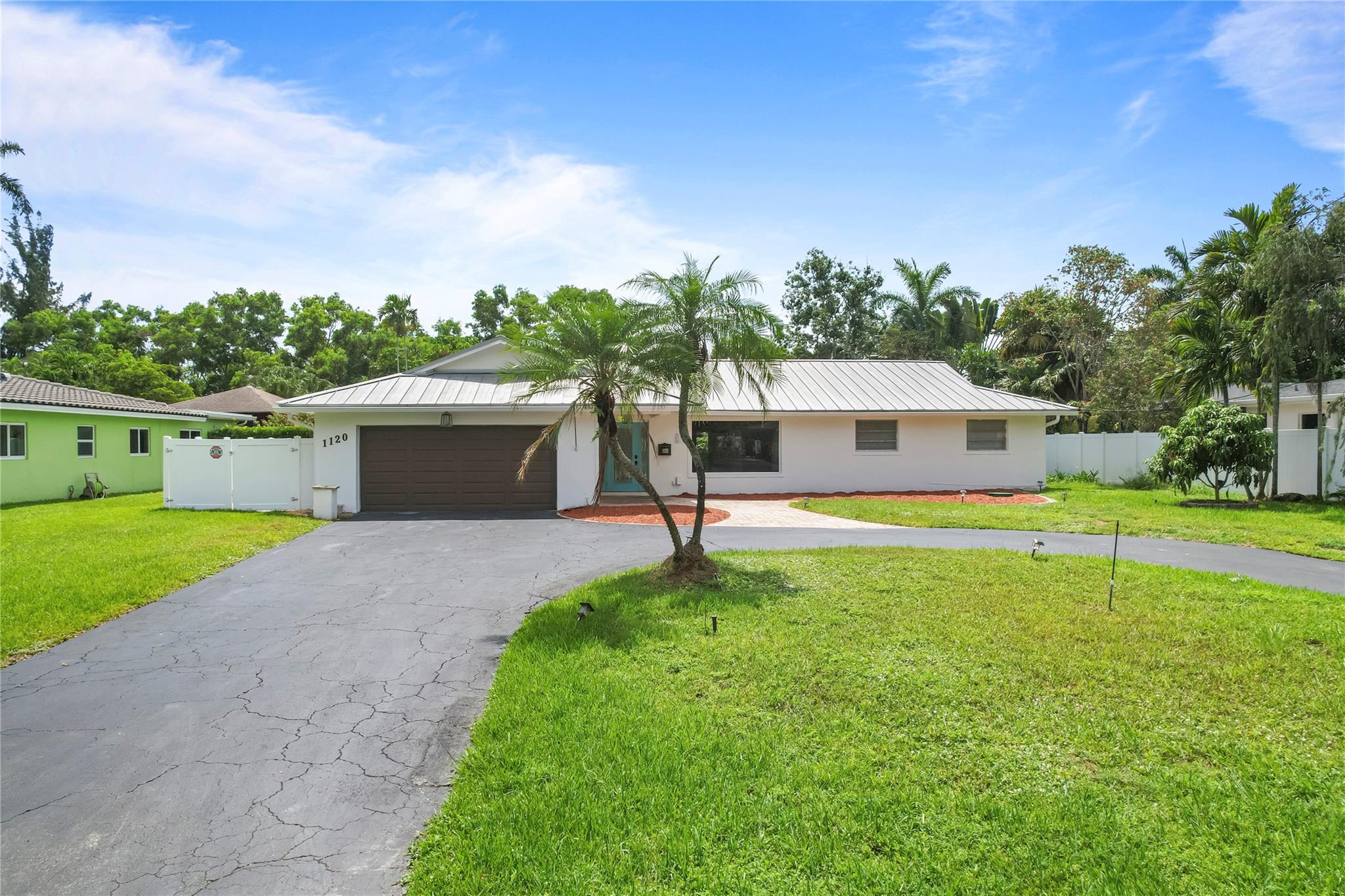 -Super large beautiful lot, lakefront 3/2 pool home 1 story home located in safe quiet neighbor "Plantation Golf Estates", kitchen with wood cabinets, granite countertops, double ovens & wine cooler. This home offers 2 living areas, formal dining room, open kitchen w/ breakfast bar, Primary retreat features updated bath with oversized shower, large soaking tub, marble counters & plantation shutters. Tile flooring throughout NO carpets. Backyard features updated pool and travertine deck, out door shower for after swimming, large covered patio and BBQ area.
-Huge back yard you can fill sand to turn it into a private Beach with a view of wide canal. Metal roof (30 years of life remaining), A/C installed in 2019. Don't miss this opportunity. WON'T LAST so submit an offer before it GONE.