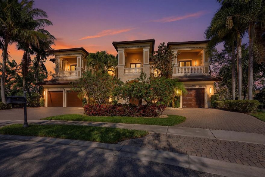 Welcome to one of the most exceptional homes in The Bridges—a truly one-of-a-kind, custom-modified Chantilly model designed for luxury, comfort, and impact. Perfectly positioned on a private cul-de-sac, this residence sits on the largest pie-shaped lot in the community, delivering unmatched privacy and breathtaking long lake views with a stunning fountain backdrop. From the moment you walk in, the home opens up with a grand, light-filled presence, finished with elegant Corsican marble flooring and designed to draw your eye straight to the water. The outdoor setting is where this property separates itself—featuring a heated pool, expansive entertaining space, and a custom putting green, all set against a wide, serene lake view that defines South Florida living. The kitchen is a true centerpiece, built for both everyday living and high-end entertaining, complete with top-of-the-line Viking and Sub-Zero appliances, custom cabinetry, and generous prep and gathering space. The primary suite on the main level is a major differentiator within the community, offering convenience and a private retreat with sweeping lake views and dual spa-inspired baths designed for comfort and functionality. Professionally designed by Nikki Levy Interiors, the home carries a cohesive, elevated look throughout—clean, modern, and timeless, with a true model-home feel. The first floor also includes a private office, guest suite, spacious great room, formal living room, custom bar, and a dedicated gym. Upstairs, a wrought-iron staircase leads to a large loft, oversized bedrooms, and a fully equipped media/theater room, giving the home incredible flexibility for both living and entertaining. Outfitted with smart home technology and a full-house generator, this property offers both convenience and peace of mind. This is not just another home in The Bridges—this is one of the best lots, best layouts, and most customized opportunities in the entire community.
