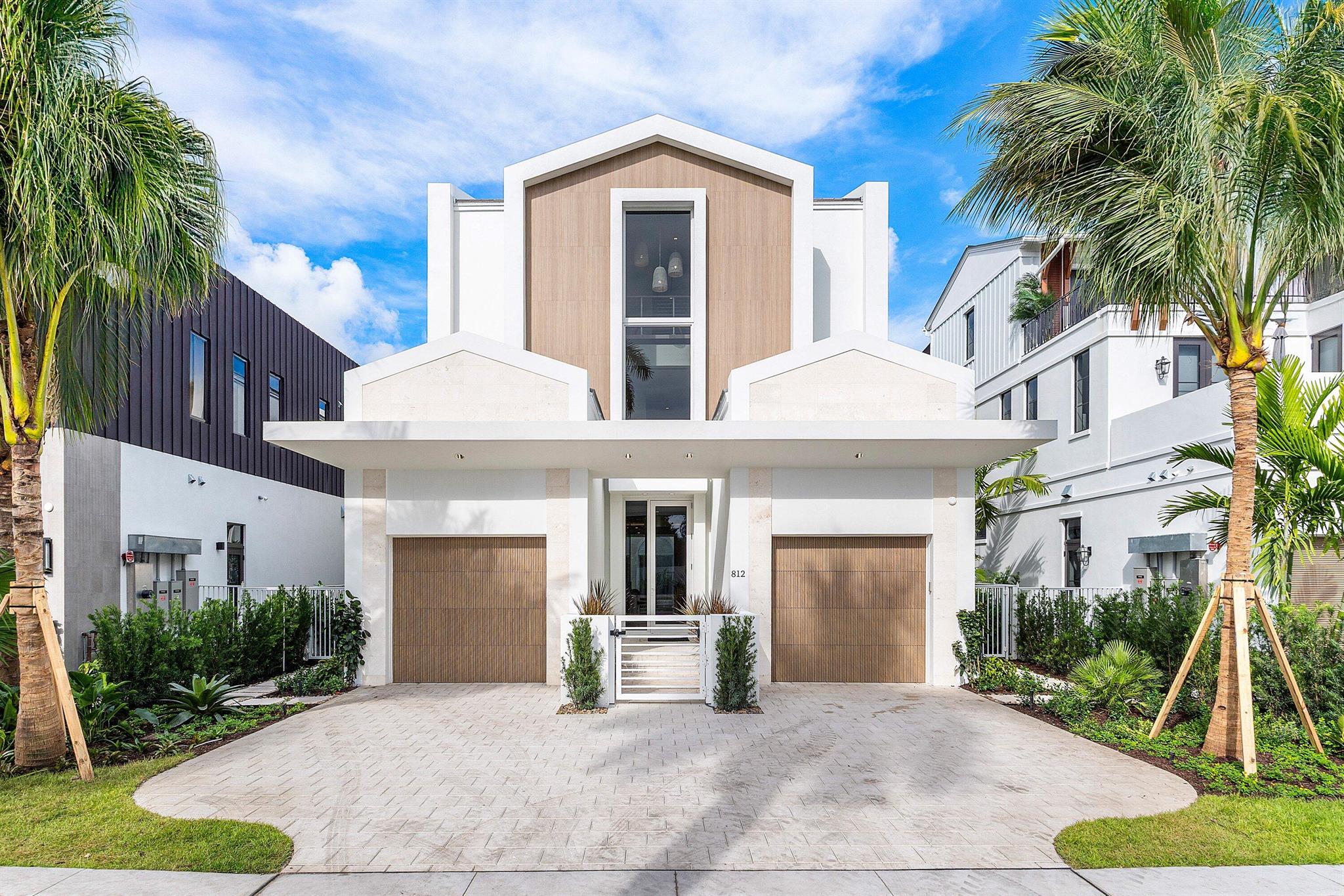 Coastal charm meets modern living on highly desirable Palm Trail in this new construction gem. This 5-bedroom, 5.1-bath residence includes a rare guest house, offering 4,813 square feet of living space and 6,635 total square feet. Designed for both relaxation and entertaining, the home features three expansive outdoor patios and decks that seamlessly blend indoor and outdoor living.Picture yourself in an idyllic archipelago, where sea breezes drift through the air and turquoise waters cradle islands like precious jewels. This is the essence of the Florida Keys -- and the inspiration behind The Keys at Cache11, a bespoke residence newly completed and beautifully staged in Delray Beach.Crafted through the collaboration of 6 of South Florida's most acclaimed teams -- Stamm Development