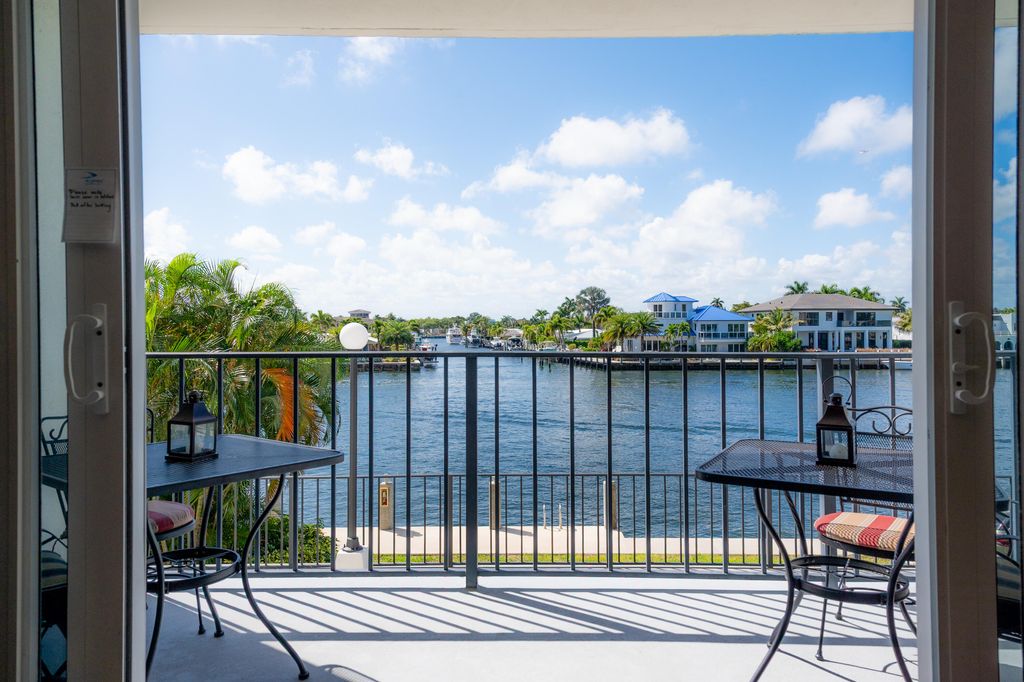 Photo of 521 N Riverside Drive #208, Pompano Beach, FL 33062 (MLS # B26002374)