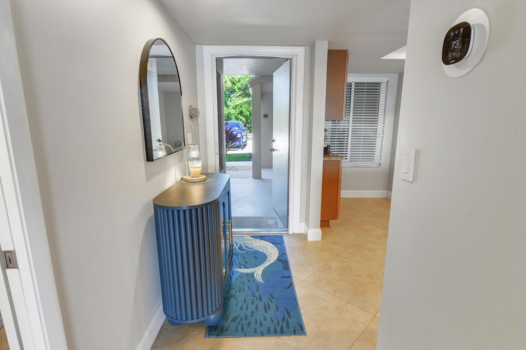 Photo of 4440 NE Sandpebble Trace #104, Stuart, FL 34996 (MLS # B26002750)