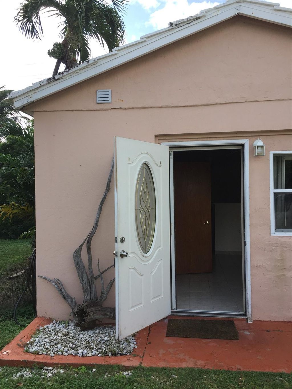 Photo of 1938 NE 5th Street, Deerfield Beach, FL 33441 (MLS # F10470881)