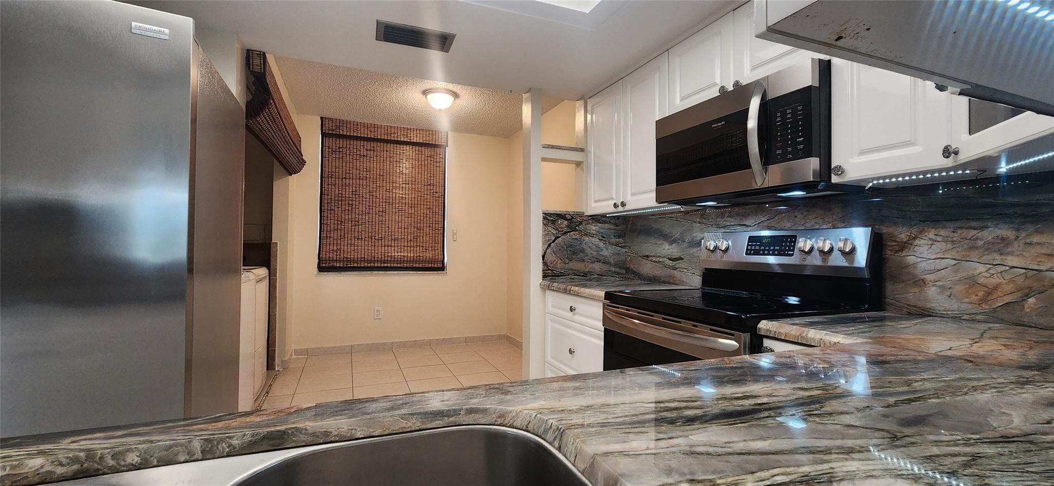 Beautifully Updated 2BR/2BA First-Floor Unit with Golf Course Views – Move-In Ready!
Beautifully renovated first-floor 2 bed, 2 bath condo in a quiet, well-maintained Margate community. Features include a fully updated kitchen with Brazilian Michelangelo quartzite countertops, modern cabinetry, and newer appliances. New A/C system, accordion hurricane shutters, and some impact-resistant windows and sliding door provide peace of mind and natural light. Full-size washer/dryer in unit, private storage room, and plenty of guest parking. Enjoy tranquil golf course views from your living space. Conveniently located near shopping, dining, and major highways. Move-in ready!