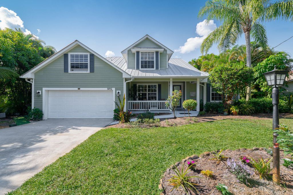 Photo of 3842 SW Saint Lucie Lane, Palm City, FL 34990 (MLS # B26029025)