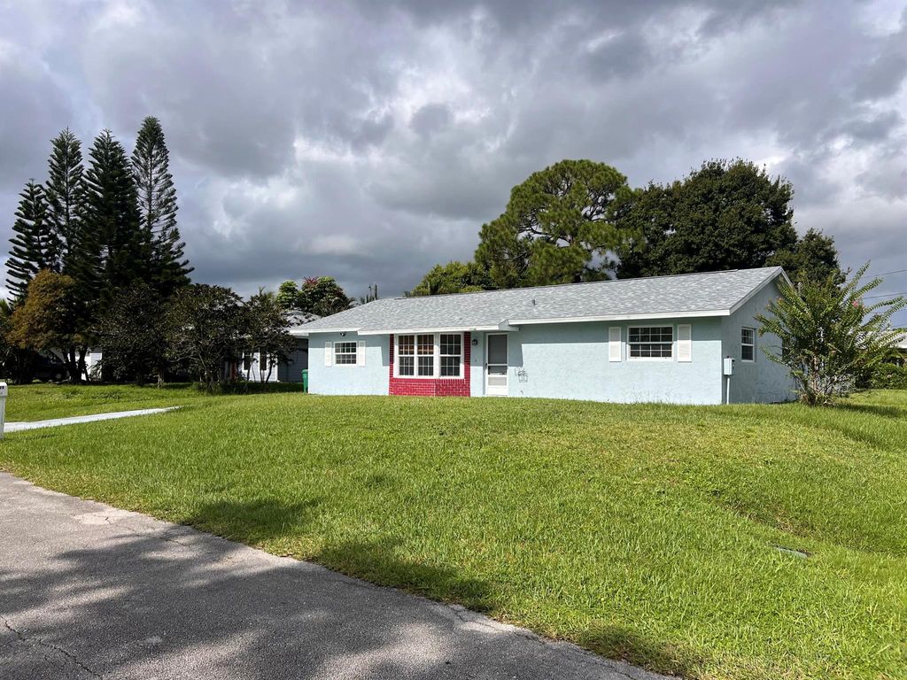 Photo of 1120 SW Ithaca Street, Port Saint Lucie, FL 34953 (MLS # R11121373)