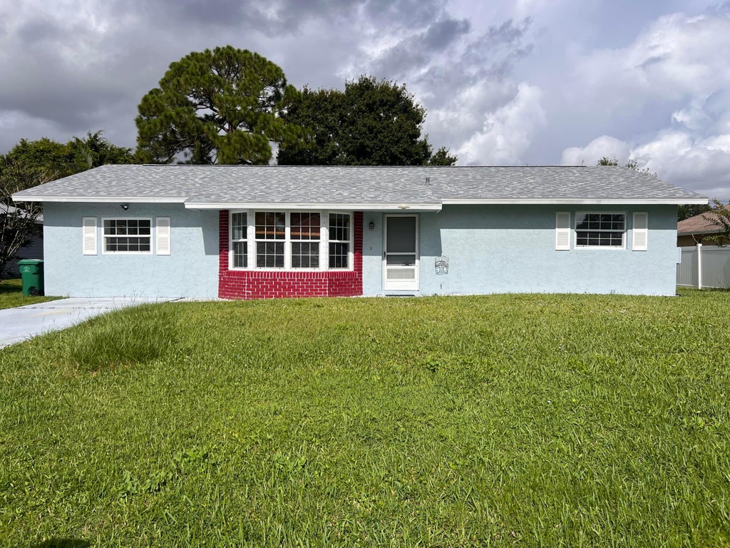 Photo of 1120 SW Ithaca Street, Port Saint Lucie, FL 34953 (MLS # R11121373)