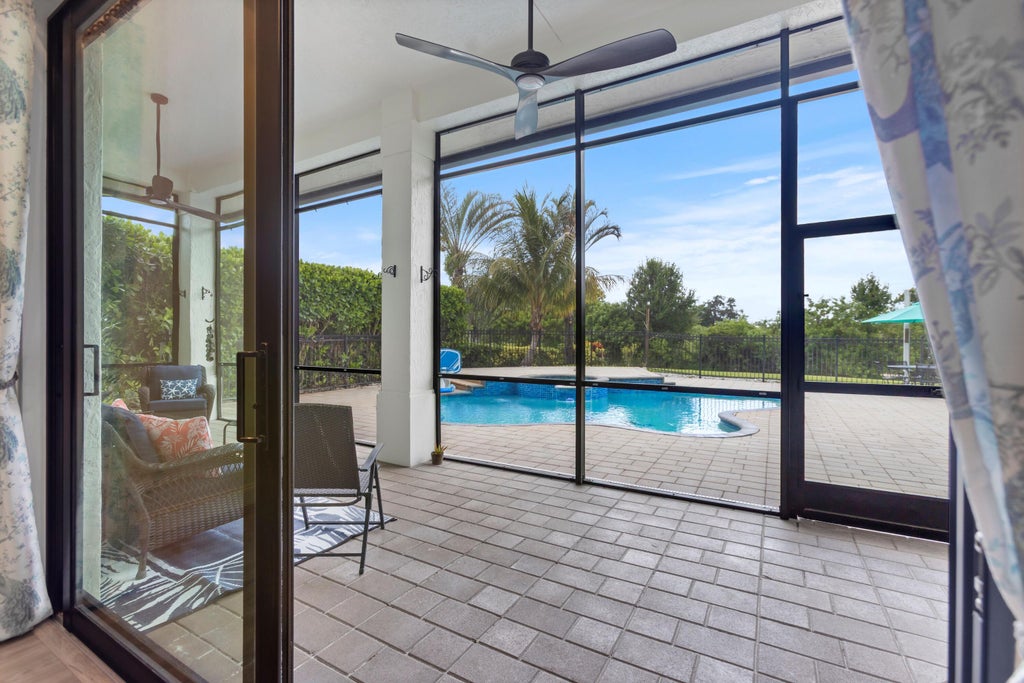 Photo of 1340 SW Squire Johns Lane, Palm City, FL 34990 (MLS # B26014431)