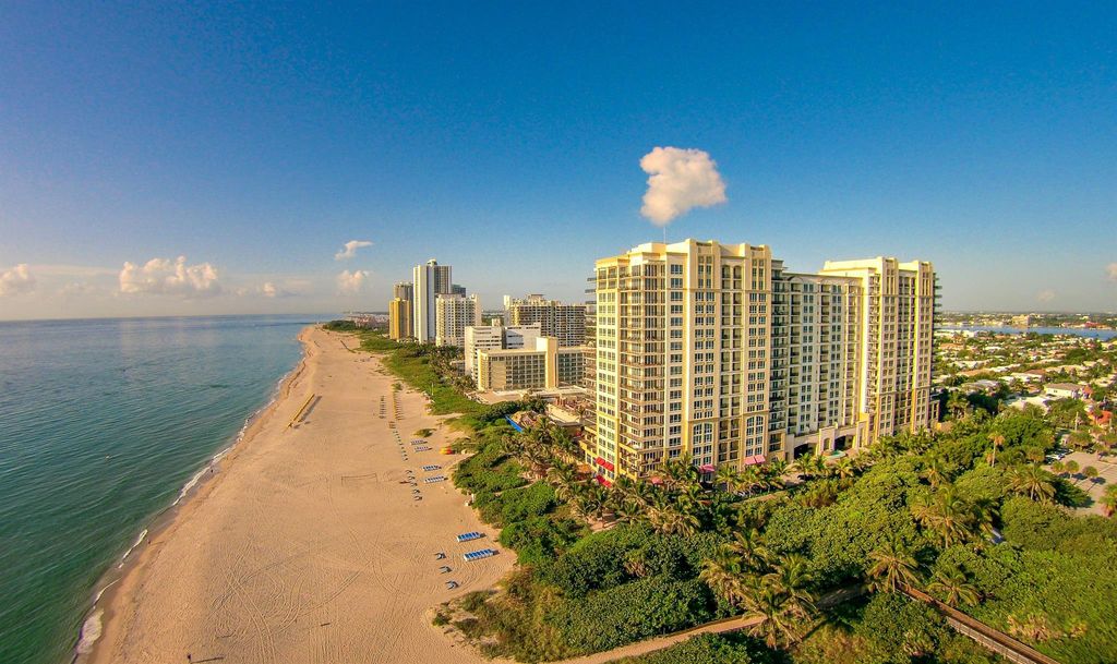 Photo of 3800 N Ocean Drive #710, Singer Island, FL 33404 (MLS # R10950318)