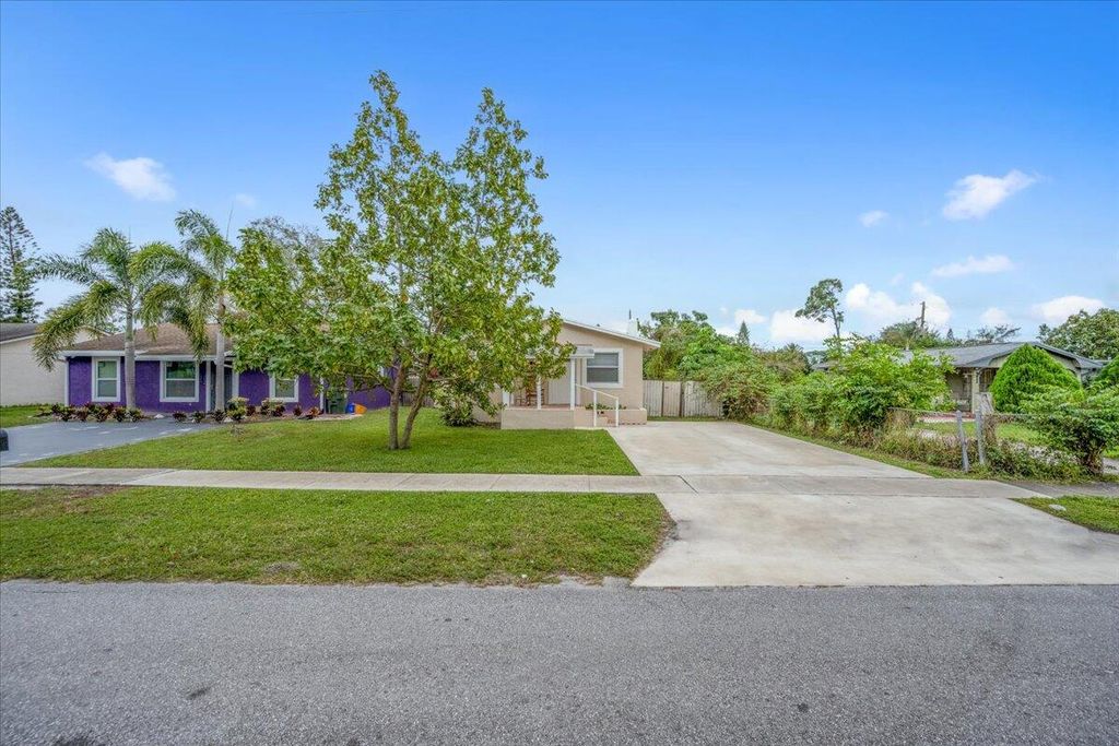 Photo of 452 Fleming Avenue, Greenacres, FL 33463 (MLS # R10772718)