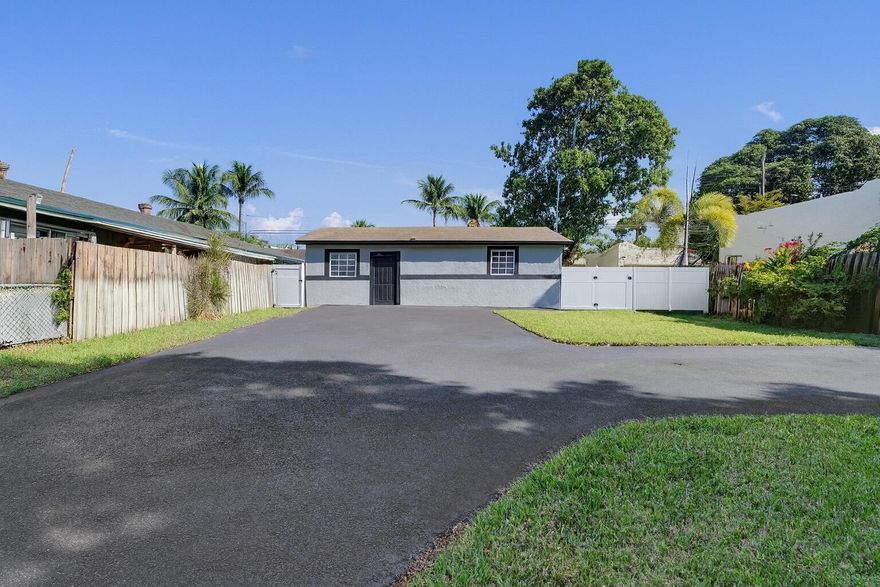 Rental income between both unit is $3,600 Take a look at this well maintained two bedroom two bathroom home on Garden Avenue in West Palm Beach, listed as a true duplex. This property offers a comfortable layout with plenty of natural light and a welcoming feel throughout. The home has been thoughtfully updated with modern finishes including renovated kitchen cabinets, quartz countertops, and stainless steel appliances. You also have the convenience of an in unit washer and dryer plus a screened patio that provides a relaxing outdoor space. The property sits on a generous lot with room for pets, gardening, or future enhancements. The driveway has been recently resurfaced and a vinyl fence is currently in permitting which will add even more privacy for the next owner.
