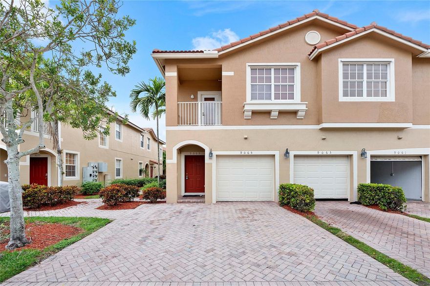 Beautiful and spacious 2-bedroom, 2-bathroom townhouse with one car garage and two additional parking spaces on the driveway,  located in the highly sought-after gated community of Hampton Hills. This well-maintained home features granite countertops, stainless steel appliances, a breakfast bar, and tile flooring throughout the main living areas, with wood floors in the bedrooms and staircase. The master suite includes a generous walk-in closet, and the unit also offers the convenience of an in-unit washer and dryer. Community amenities include a heated pool, clubhouse, fitness center, children’s playground, and secured gated access. Monthly payment includes water, basic cable & exterior maintenance.