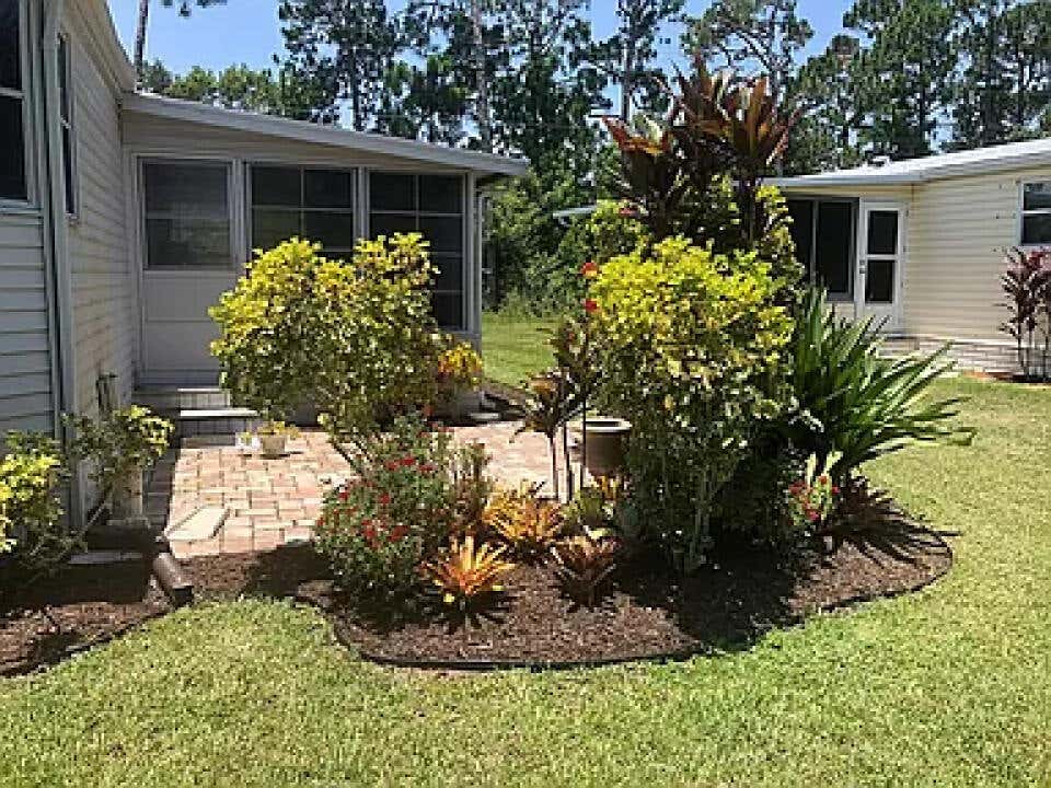 Photo of 206 Travis Cay Place #8, Fort Pierce, FL 34982 (MLS # R10932186)