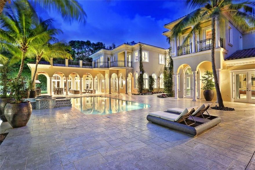 Custom built, private estate on the most desirable & prestigious street in North Pinecrest. The home flawlessly displays superb workmanship & fine detail from the unique coffered ceilings in each room to the hi-tech smart-home system. Dual chef kitchens, theater, game room w/ bar are just a few of the exceptional interior features. The property is gated & walled w/ ample parking, 4 car garage, ½ basketball court, in-ground trampoline, resort-style pool, pool house & summer kitchen. Ideal for entertaining!