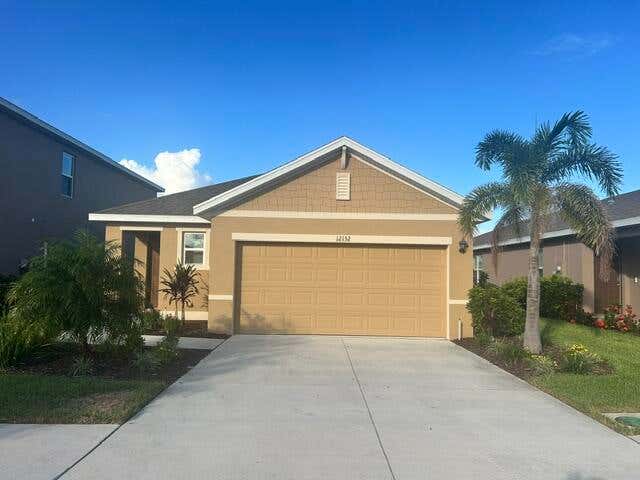 Photo of 12152 SW RIMINI Way, Port Saint Lucie, FL 34987 (MLS # B26057171)