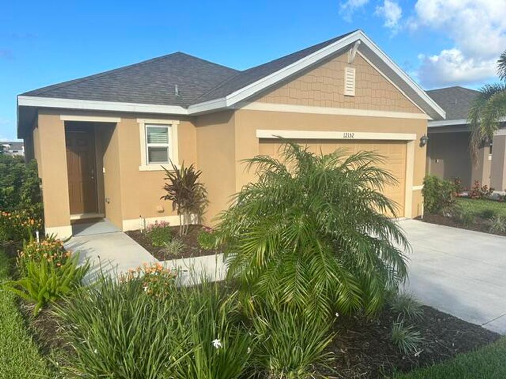 Photo of 12152 SW RIMINI Way, Port Saint Lucie, FL 34987 (MLS # B26057171)