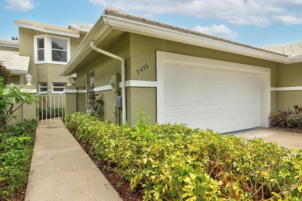 Photo of 2435 SW Foxpoint Trail, Palm City, FL 34990 (MLS # R10967958)