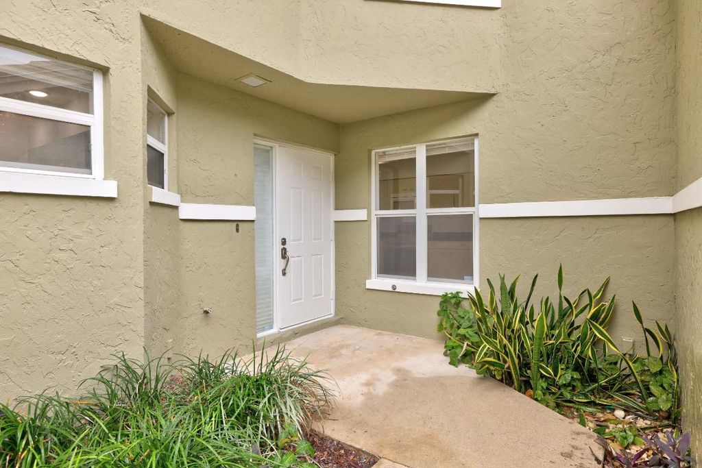 Photo of 2435 SW Foxpoint Trail, Palm City, FL 34990 (MLS # R10967958)