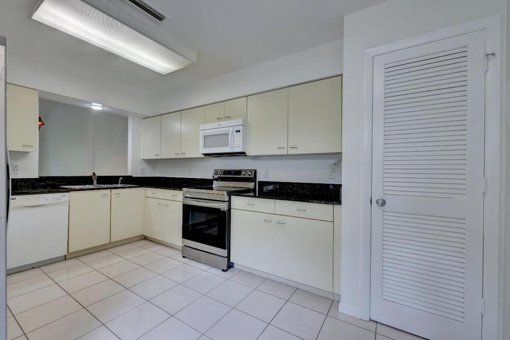 Photo of 2435 SW Foxpoint Trail, Palm City, FL 34990 (MLS # R10967958)