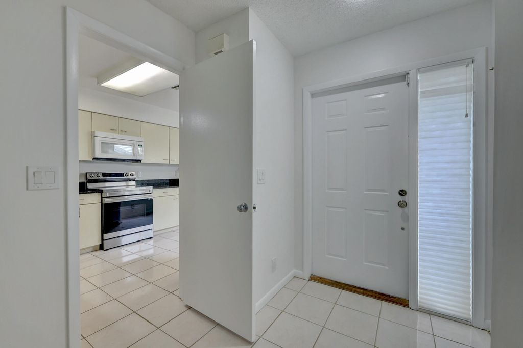 Photo of 2435 SW Foxpoint Trail, Palm City, FL 34990 (MLS # R10967958)