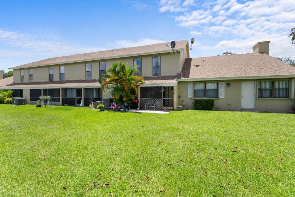 Photo of 2702 Maplewood Drive, Greenacres, FL 33415 (MLS # R11007450)