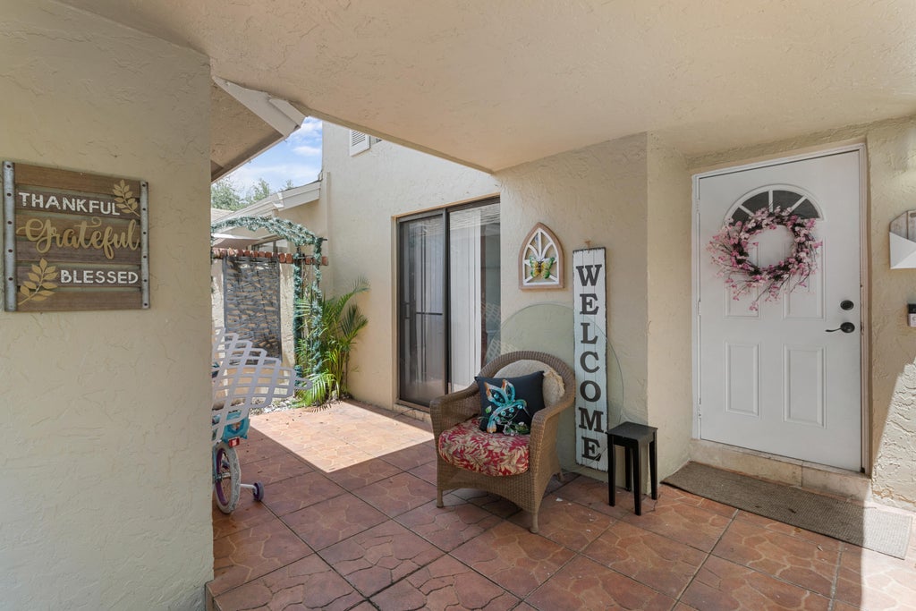 Photo of 2702 Maplewood Drive, Greenacres, FL 33415 (MLS # R11007450)