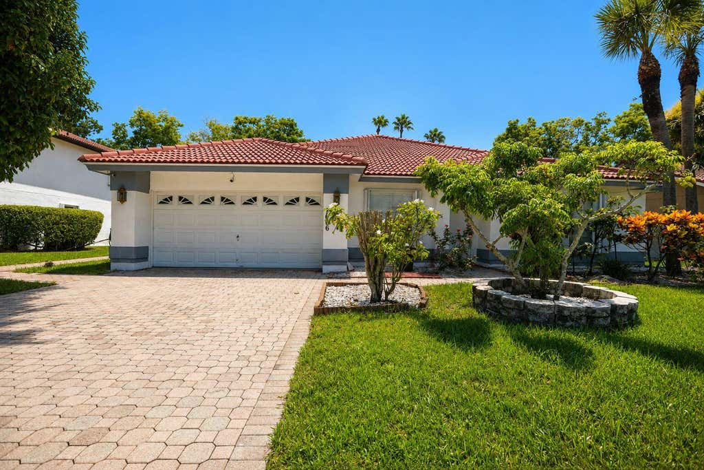 Photo of 7606 Briar Cliff Circle, Lake Worth, FL 33467 (MLS # B26065378)