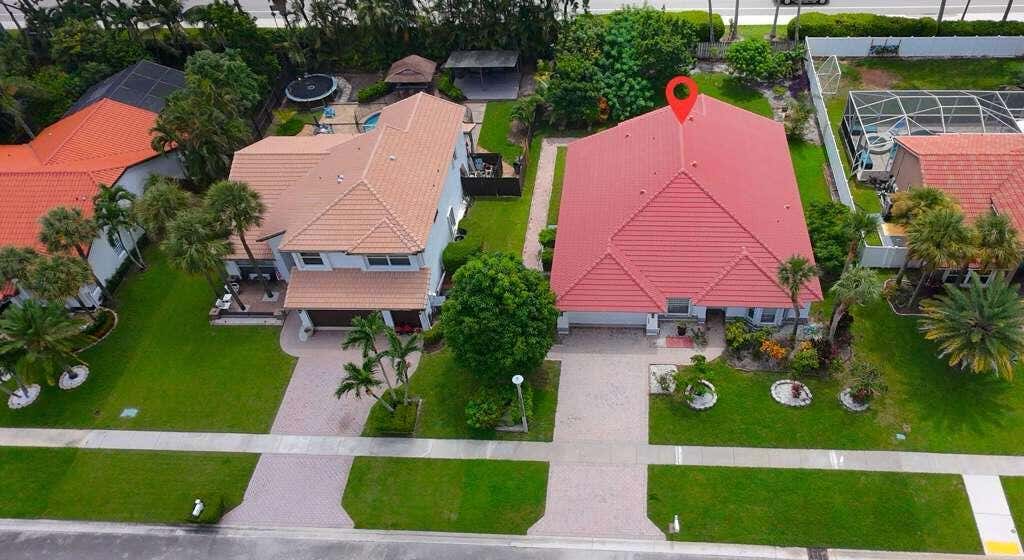 Photo of 7606 Briar Cliff Circle, Lake Worth, FL 33467 (MLS # B26065378)