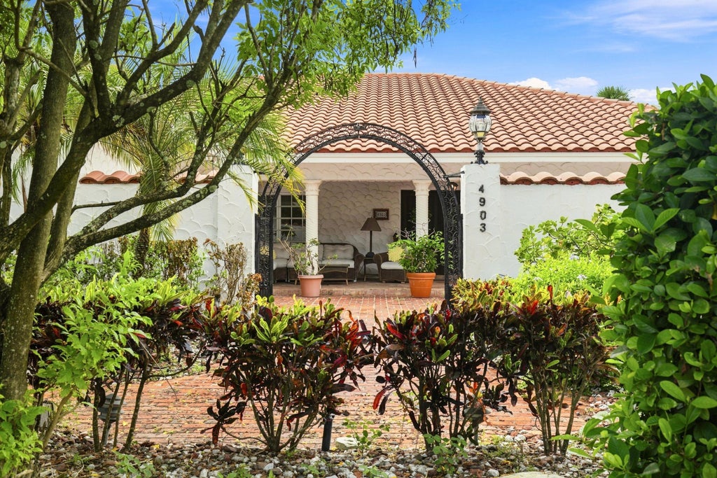Photo of 4903 WOODLANDS Boulevard, Tamarac, FL 33319 (MLS # B26069014)