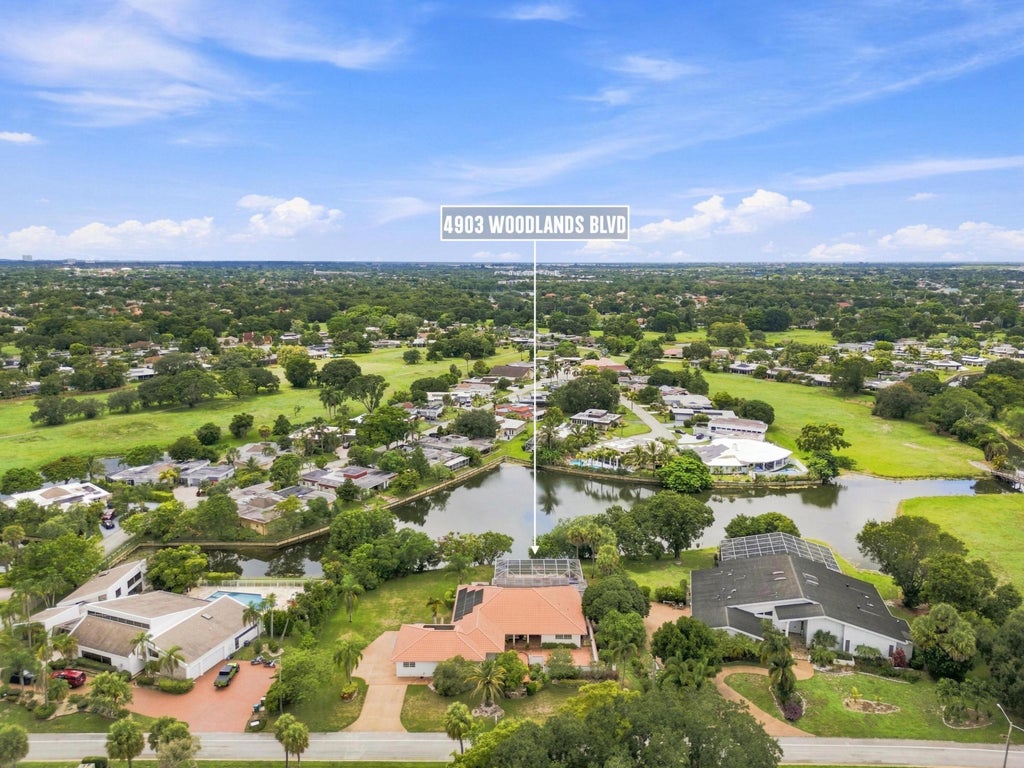 Photo of 4903 WOODLANDS Boulevard, Tamarac, FL 33319 (MLS # B26069014)