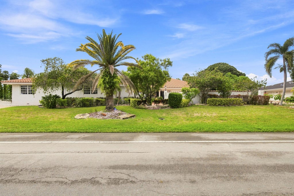 Photo of 4903 WOODLANDS Boulevard, Tamarac, FL 33319 (MLS # B26069014)