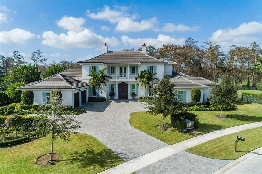 No detail has been overlooked in this custom estate home located on over 1/3 acre in the exclusive Blue Cypress section of Palm Beach Polo community. Featuring 5 beds, 5.2 baths, 3-car garages, with sweeping views of the Cypress Golf Course and an open floor plan that is perfect for entertaining. Additional luxuries include a first-floor master suite, marble master bathroom, guest suite, chef's kitchen, wine bar, soaring ceilings, impact glass, full house generator and much more! Also includes Smart House state-of-the-art technology valued at over $200,000. Relax in the spacious backyard featuring a large covered lanai, outdoor kitchen, over sized pool and spa with luscious tropical landscape and custom audio technology.  VACANT LOT IS INCLUDED.