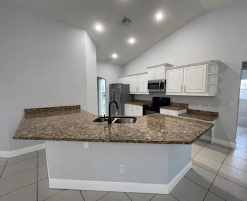 Photo of 3118 SE Salerno Road, Stuart, FL 34997 (MLS # R10980682)