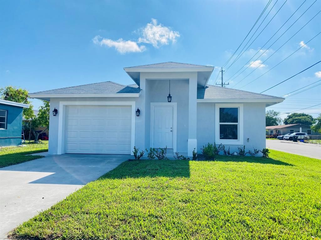 Photo of 1432 S J Street, Lake Worth Beach, FL 33460 (MLS # R10743465)