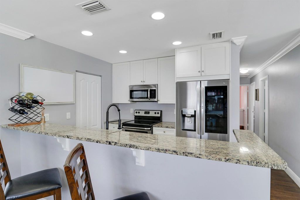 Photo of 532 Riverside Drive, Palm Beach Gardens, FL 33410 (MLS # R11082478)