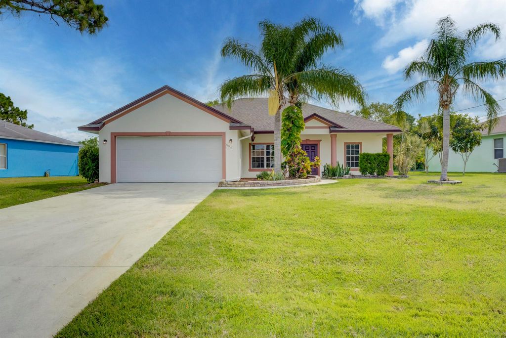 Photo of 6041 NW Wolverine Road, Port St Lucie, FL 34986 (MLS # R10895103)