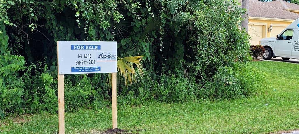 Photo of 320 SW Enon St, Port Saint Lucie, FL 34953 (MLS # F10295445)
