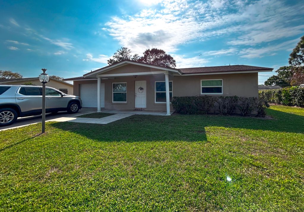 Photo of 4709 Sunset Boulevard, Fort Pierce, FL 34982 (MLS # B26007957)
