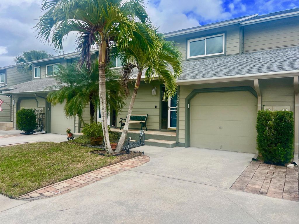 Photo of 3254 NE Holly Creek Drive, Jensen Beach, FL 34957 (MLS # R10953040)