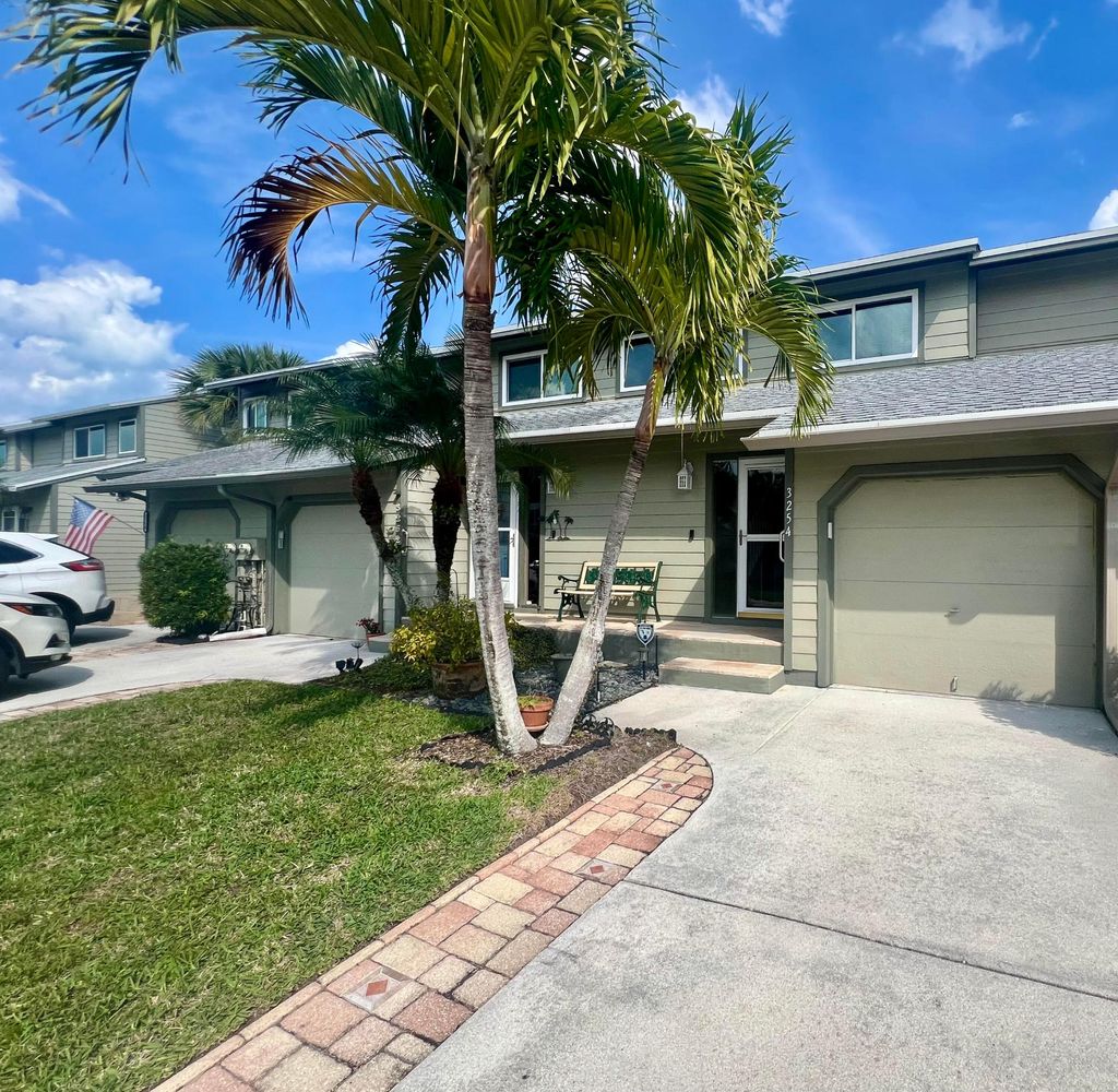 Photo of 3254 NE Holly Creek Drive, Jensen Beach, FL 34957 (MLS # R10953040)