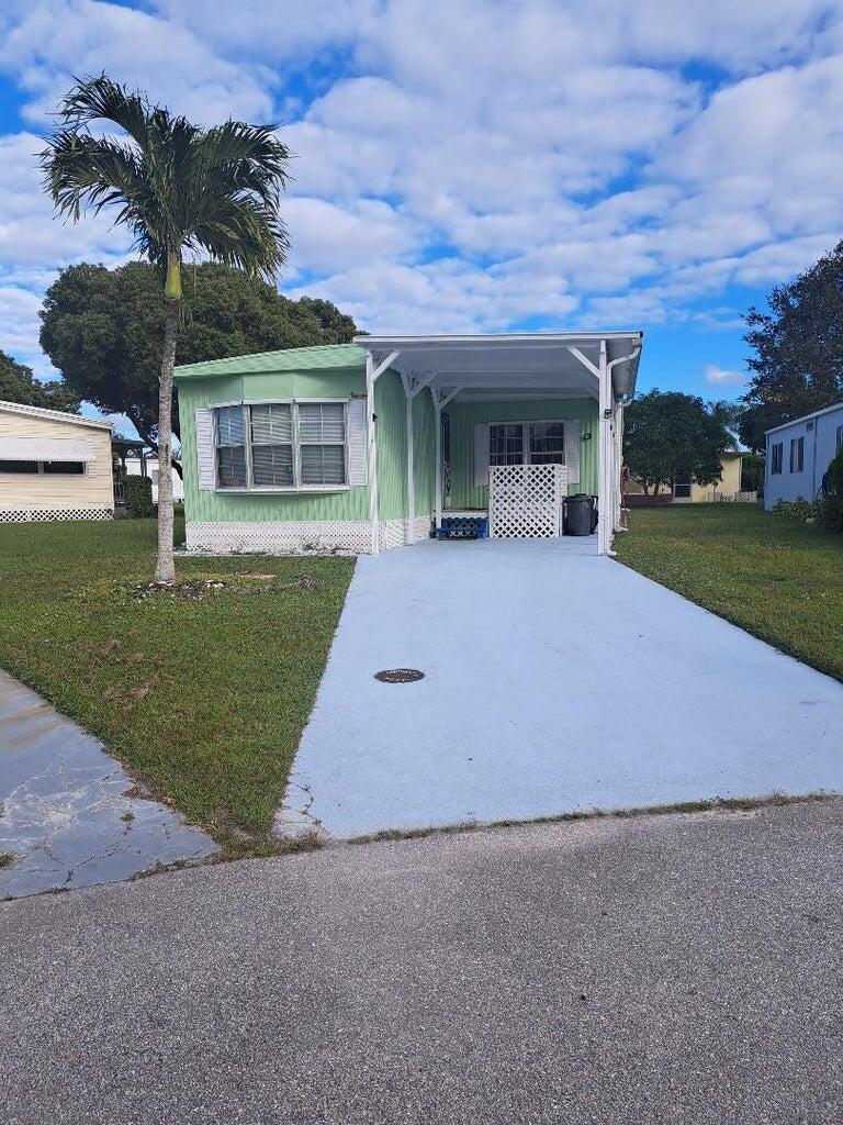 THIS MANUFACRURED HOME IS IN A 55+ COMMUNITYBH/1146049/1This NEWLY Remodel 2 Bedroom/ 2 Bath with split floor plan comes partially furnished. ALL NEW ceramic tiles and wood floors throughout, All new high seat toilets, parceling titled showers, all new cabinets and stainless steel appliances. FRESHLY painted inside and out all new electrical and plumbing, NEW ALUMIUM ROOF LESS THAN A MONTH OLD WITH 10 YEARS WARRANTY, this is a MUST SEE owner financing is available with 30000down.buyers has to park approved. Spanish Lakes is a golfing community seven days per week, pool, aerobics, line dance, water, volleyball, ping pong bingo, low stakes poker, tennis SECURITY THAT DRIVES around ,fishing, LAWN CARE AND,MUCH MORE