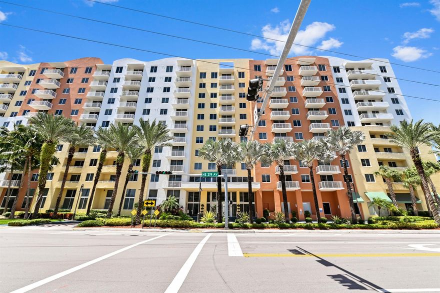 In the heart of Aventura, sits an urban sanctuary - a contemporary 2-bed, 2-bath condominium on the 8th floor of a secure & amenity-rich building. On stepping into the unit, you are met with newer laminate flooring running throughout, bringing an atmosphere of crisp modernity combined with the warm touch of homeliness. The open-plan layout navigates effortlessly through the spaces, enhancing not only functionality but also the sense of openness. The piece de resistance of the unit is the breathtaking balcony. Covered to provide shade & protection, it brings an essential outdoor dimension to this urban residence. Serving magnificent views of the water, it is an ideal spot for savoring morning coffees as the sun awakens the city or for hosting intimate gatherings under the star-studded sky