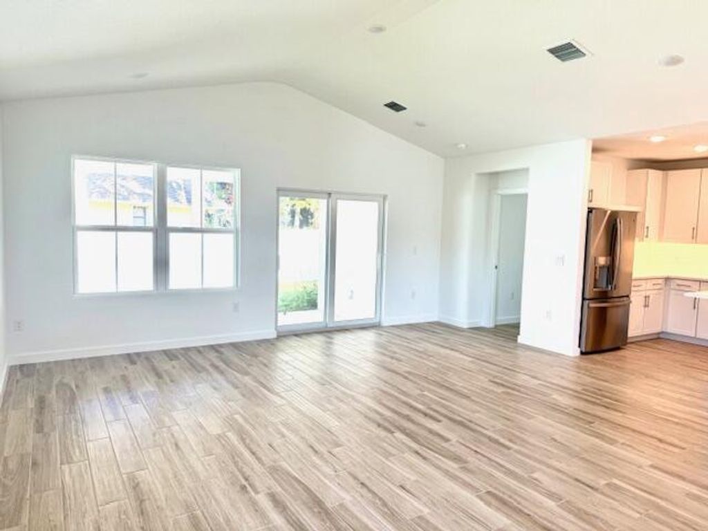 Photo of 1689 SW Abingdon Avenue, Port Saint Lucie, FL 34953 (MLS # R11158837)