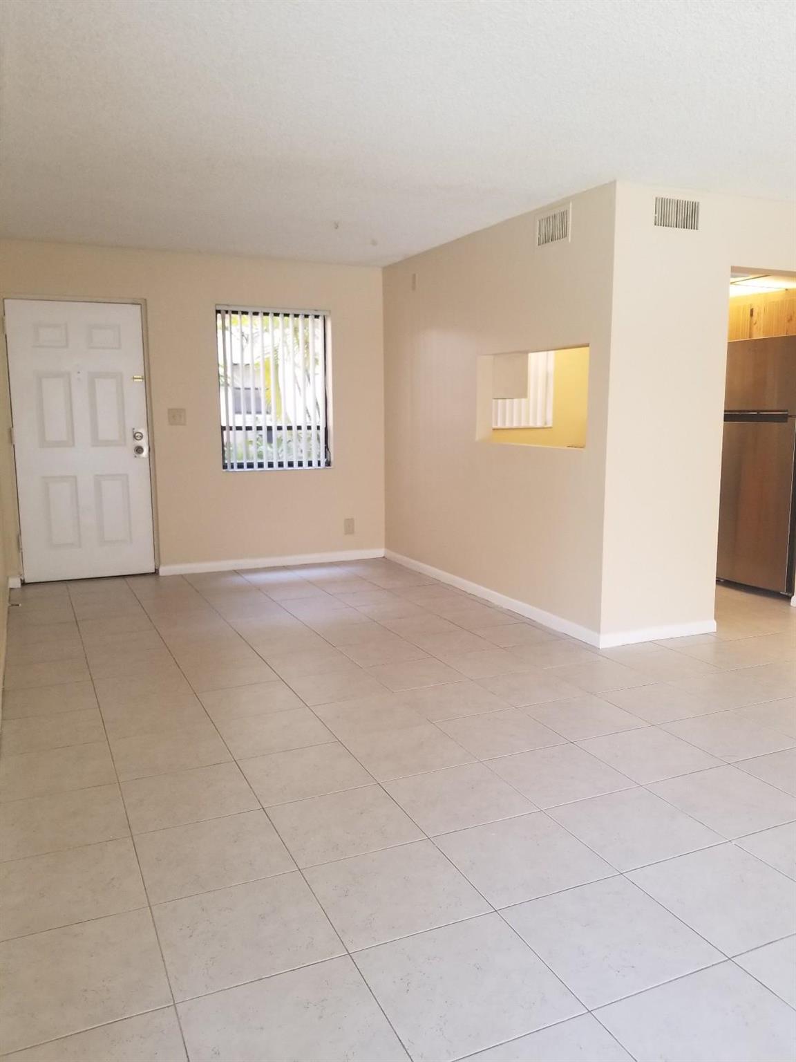 Beautifully remodeled first-floor unit in the desirable Presidential Golfview Community! This spacious 1 bedroom, 1 bath apartment features a large living room, modern stainless steel appliances, and tile flooring throughout. Conveniently located near I-95, the beaches, and Palm Beach International Airport. Just minutes away from the Palm Beach Outlets! Don't miss out on this fantastic location!