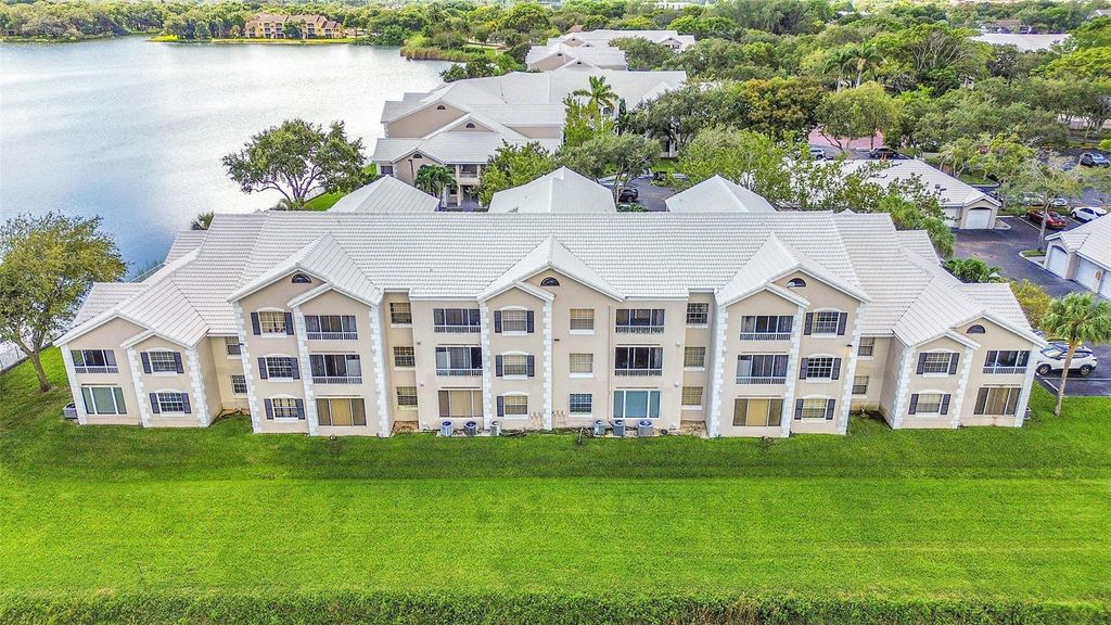 Photo of 2841 N Oakland Forest Dr #106, Oakland Park, FL 33309 (MLS # F10532182)