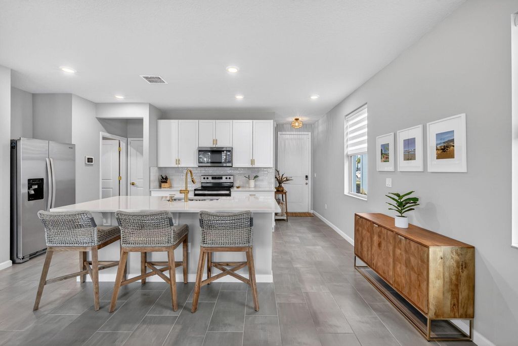 Photo of 258 Osprey Preserve Boulevard, Jensen Beach, FL 34957 (MLS # R11164641)