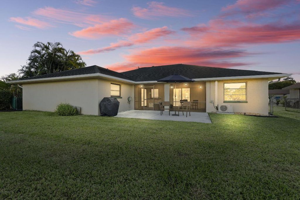 Photo of 2099 SE Bowie Street, Port Saint Lucie, FL 34952 (MLS # R11143938)