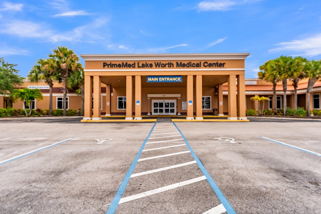Photo of 7408 LAKE WORTH Road, Lake Worth, FL 33467 (MLS # B26077495)