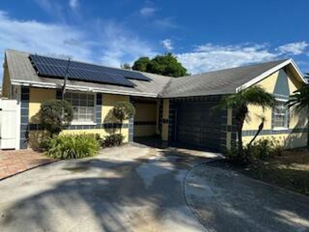 Photo of 7250 San Castle Boulevard, Lake Worth, FL 33462 (MLS # R11124040)