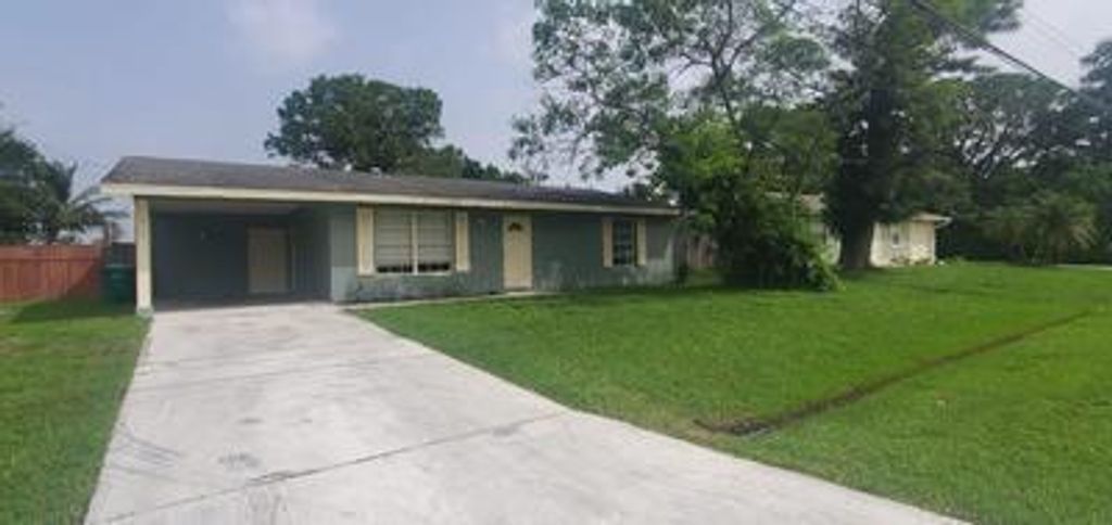 Photo of 413 SW Duval Avenue, Port St Lucie, FL 34983 (MLS # R10926488)